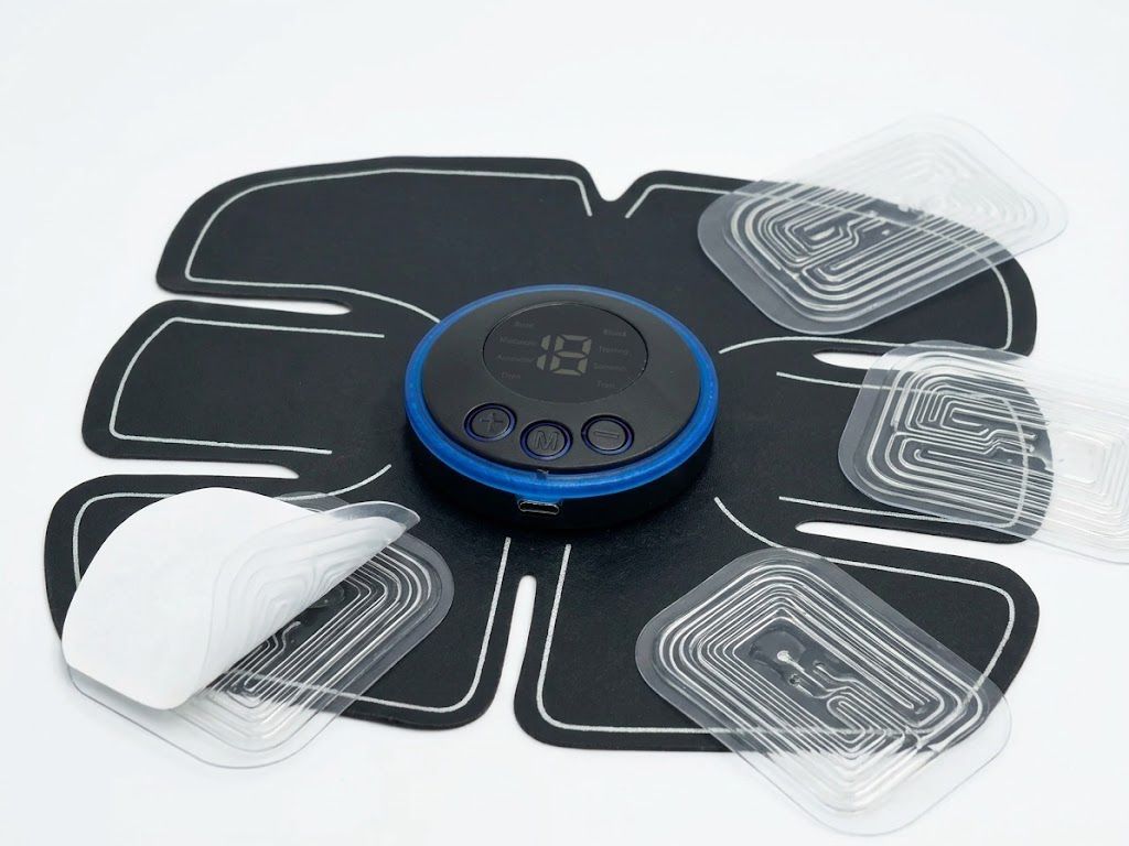 Electro estimulador abdominal Click & Go detalle dispositivo electrodos recargable USB